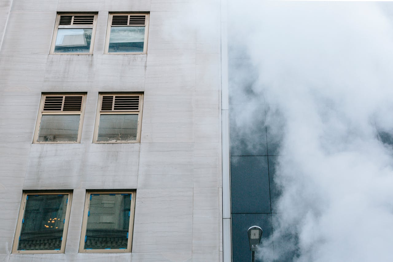 Building facade with fog creating a mysterious urban mood.